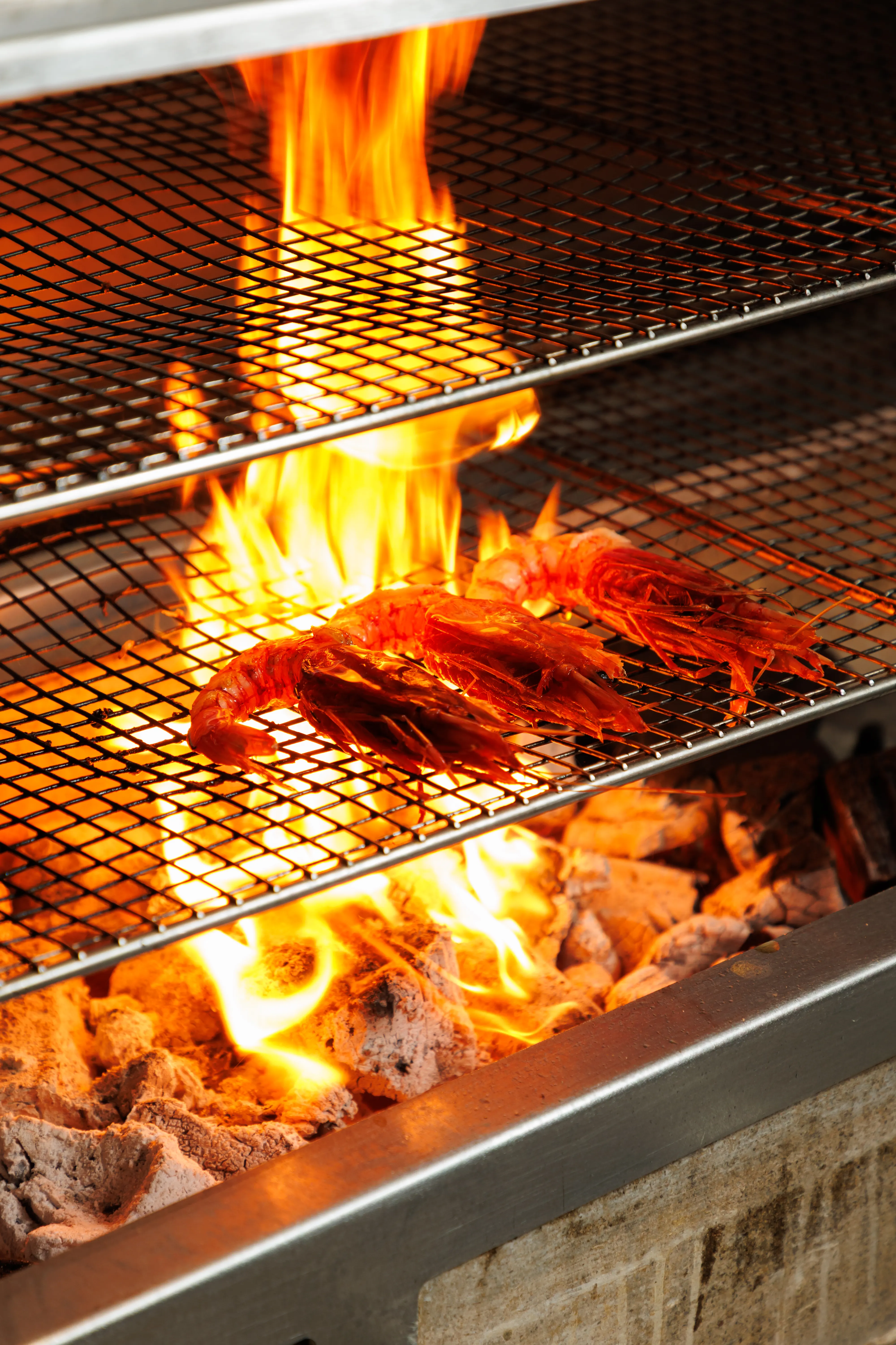 Over the coals