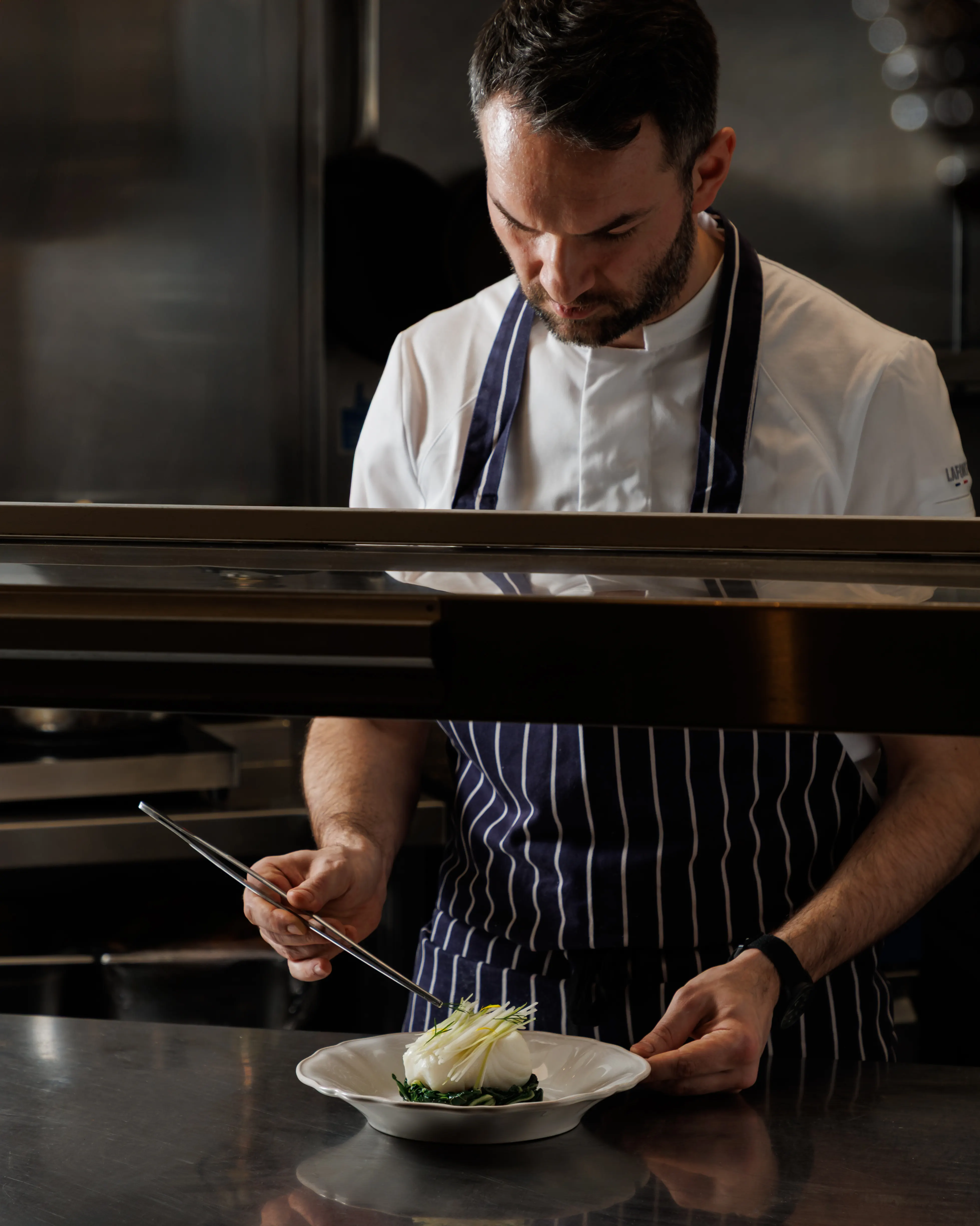 Chef Slawek at the pass